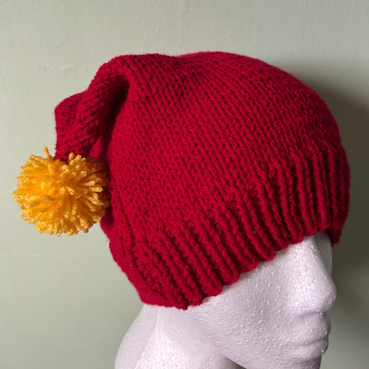 Red Knitted Hat with Yellow Pom Poms