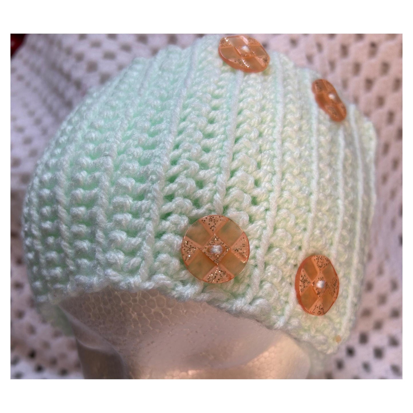 Crochet Headband: Green Ear Warmer with Peach Sparkly Buttons