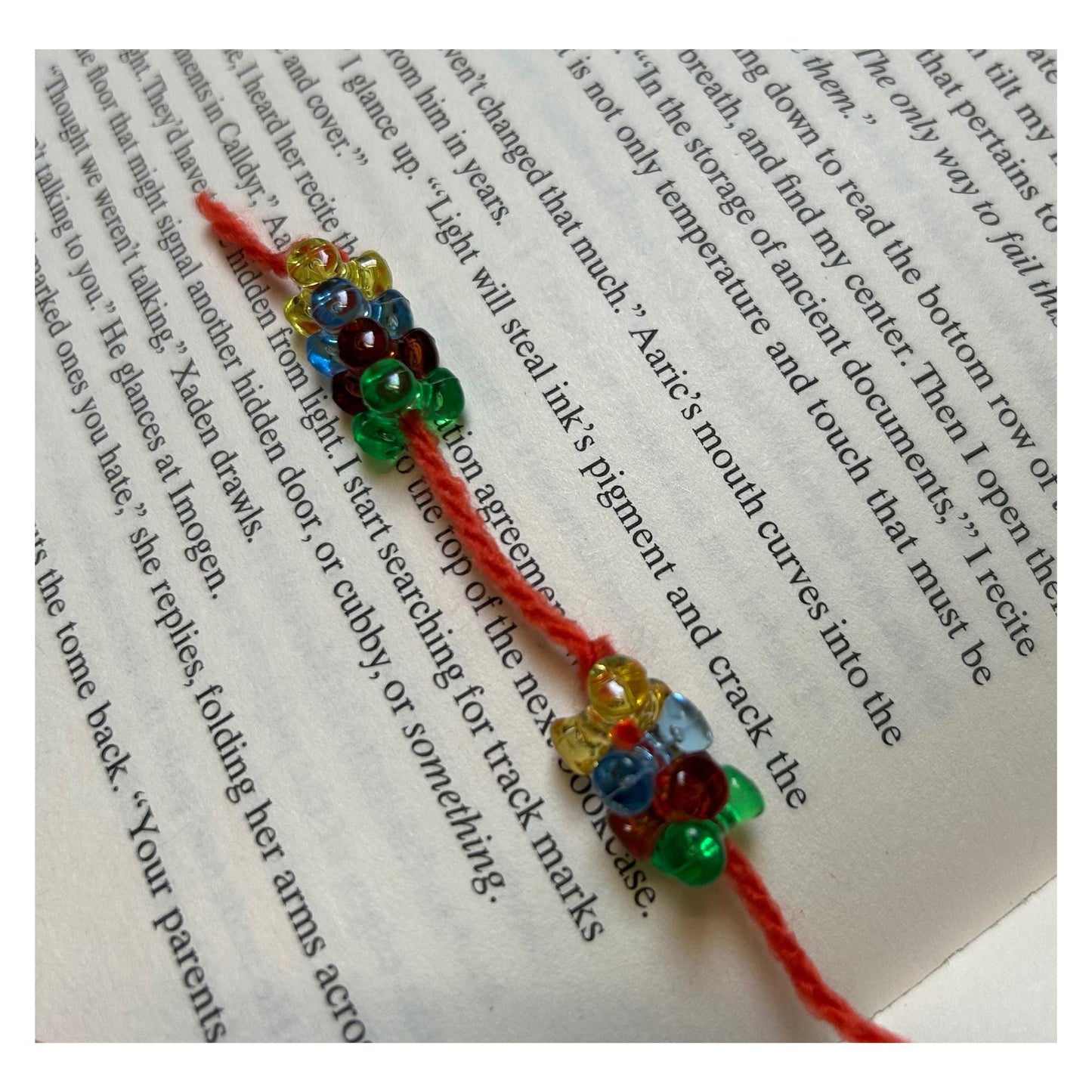 Crocheted Floral Bookmark: Orange Fabric with Colorful Beads